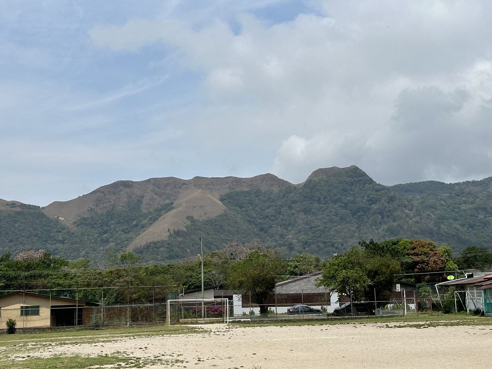 Green mountain ridge above El Valle under a cloudy sky