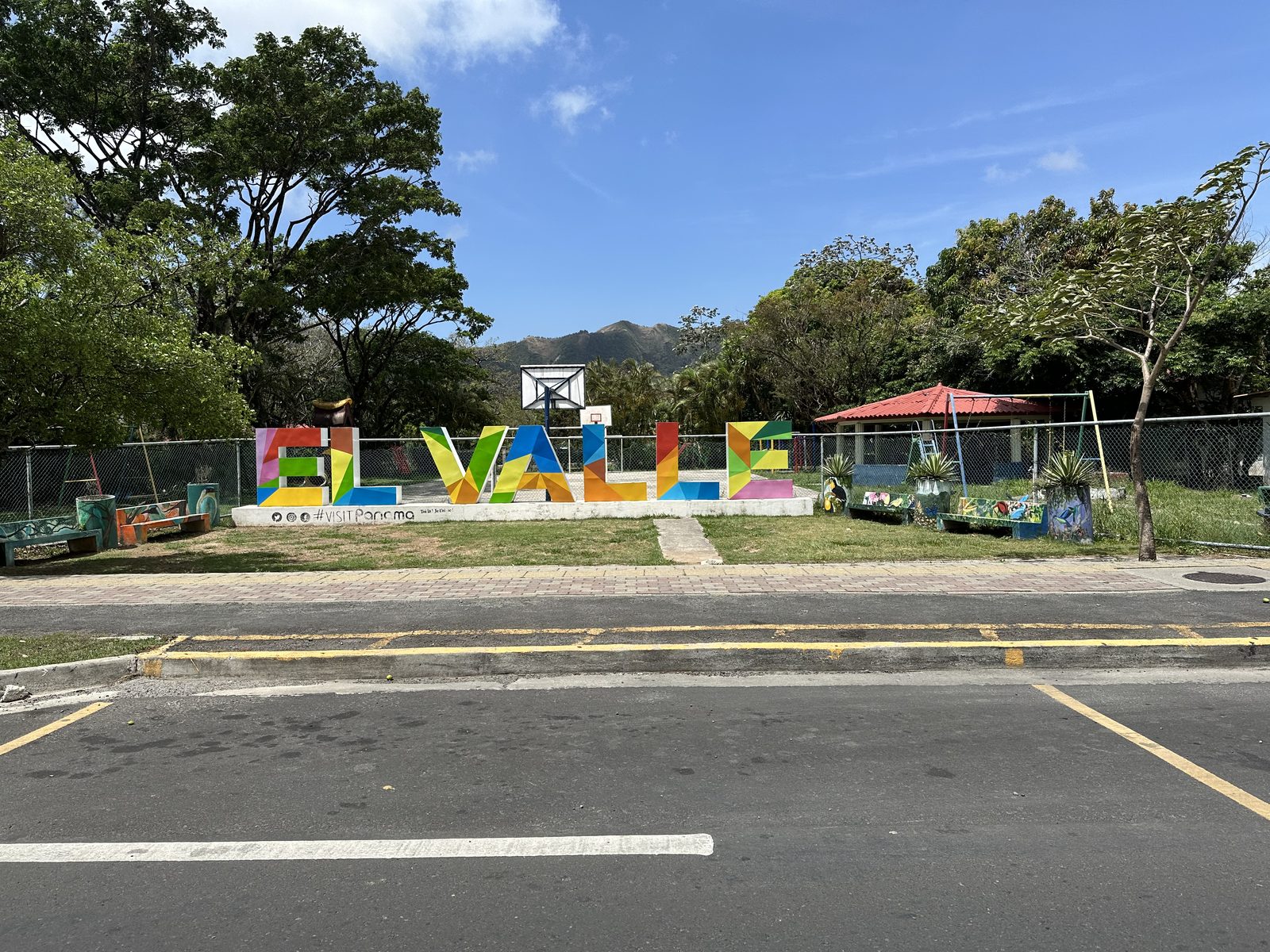 The colorful El Valle sign beside the road